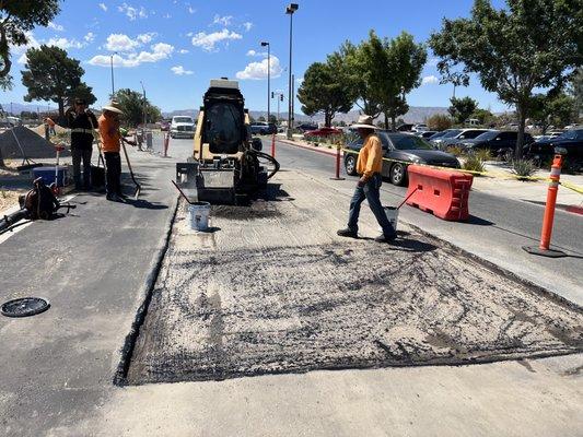 Cold planning 'grinding' for asphalt overlay.