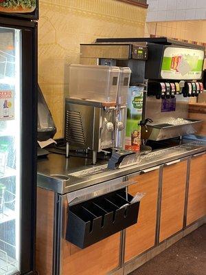 Completely destroyed beverage station with a non-functioning soft beverage dispenser