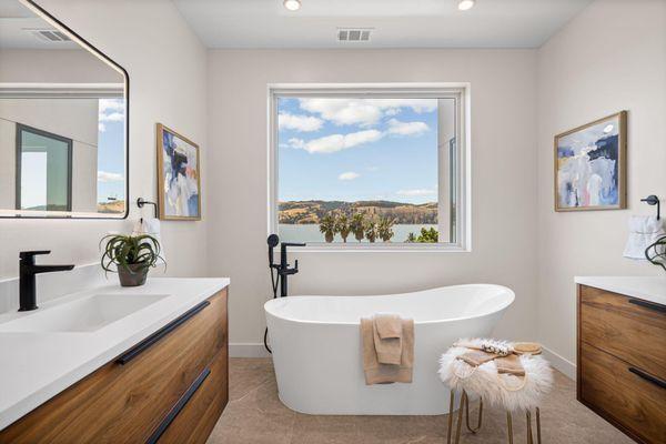 Organic modern bathroom design, showcasing our Parker bathroom vanity collection in Natural Walnut.