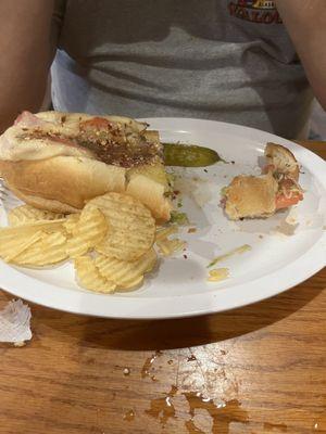 My husband's Italian sub half eaten.