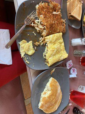 Veggie omelet with hash browns and pancakes (included in meal)