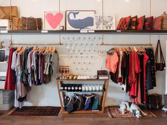 Shop view of our earring display and clothing