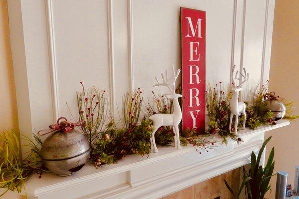 The jingle bells anchoring the mantel.