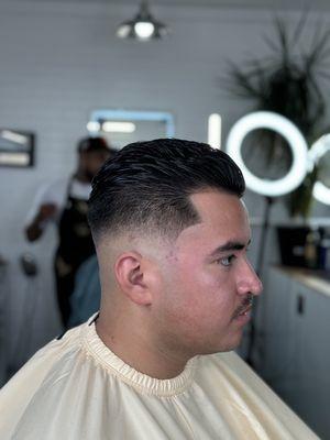 SLICK BACK HAIRCUT WITH MID FADE