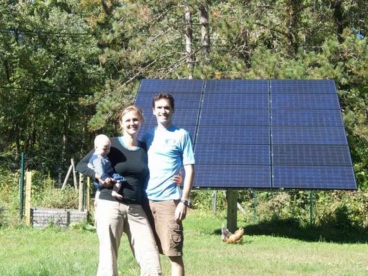 Residential, ground-mount solar electric system installation by New England Clean Energy.