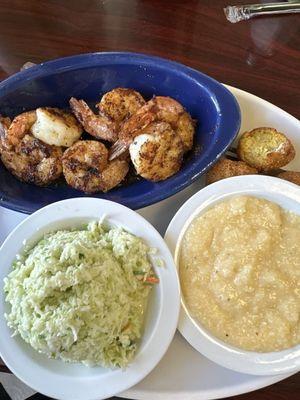 Grilled shrimp ; hush puppies ; cole slaw & cheesy grits