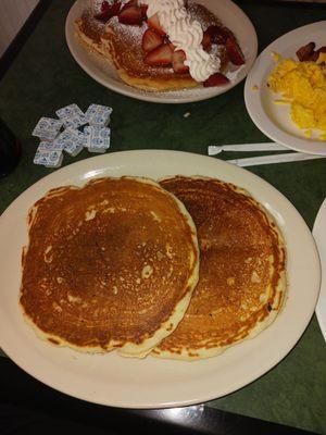 Pancakes(Plain) pancakes with whipped cream and .