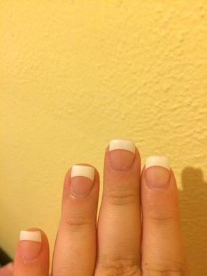 I got acrylic French tip nails. They cost $35, and a couple of the nails are a bit crooked.