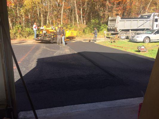 Workers and Paving Machine