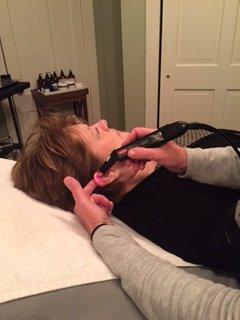 Laser therapy used at varying auricular acupuncture points.