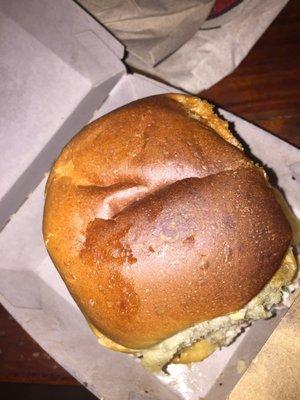 Burnt bun on chicken salad sandwich.