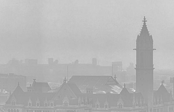 The spire is still visible on a misty late afternoon