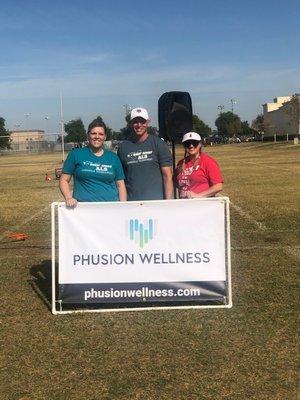 Phusion Wellness staff participating in the community to support non-profit events.