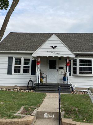 This was what our home looked like before they replaced our siding