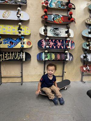 My youngest posing for a pic while my other boys shop