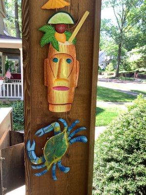 These are just two of the Haitian metal art. Their colorful, playful display brightens my day every time I come out to enjoy my porch!