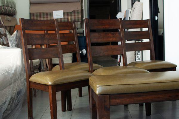 Dining room chairs reupholstered in a beautiful olive vinyl