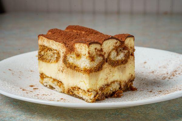 Coffee soaked lady fingers, mascarpone, and cocoa powder on top