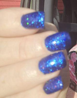 Pretty blue sparkle nails. So many compliments on them. Go see Daniel.