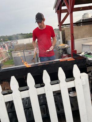 Cooking up some yummy burgers and HUGE dogs