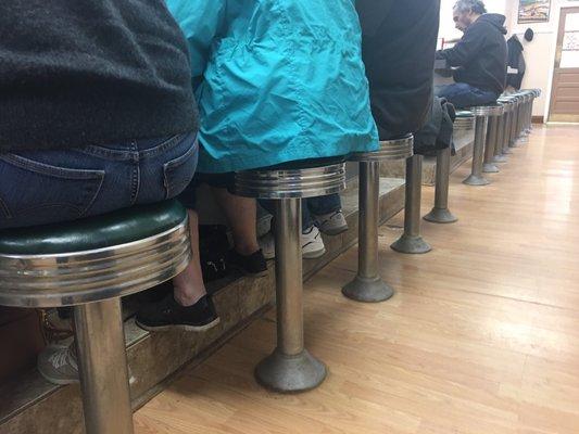 Our butts on the Old-fashioned soda fountain stores at Choo Choo Charlie's.