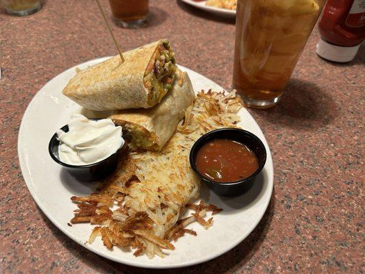 Choice of bacon or sausage, scrambled eggs*, hash browns, pico de gallo, and cheddar, in a warm flour tortilla. $11.99