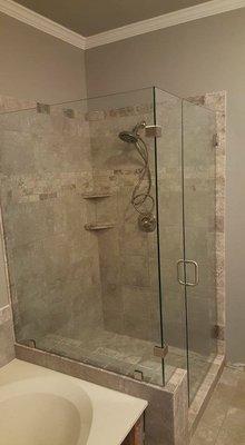 Heavy Glass Shower Door with Two Panels.  C-Pull Handle and Brushed Nickel Finish