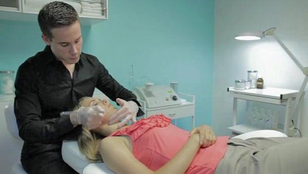 Andy performing a DermaSweep treatment on Miss Oregon