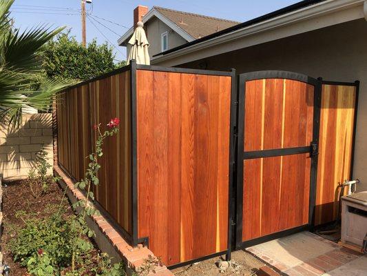 Wood fence with steel