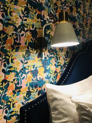 Stylish wallpaper that gives the room a fun pop!