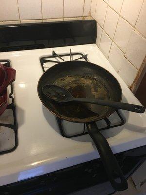 Greasy pan left on the stove