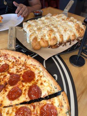 Pepperoni and bread sticks