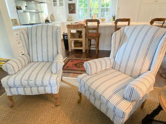 Armchair set reupholstered with a cool white and blue striped performance material.