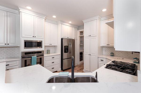 Bright white kitchen by EMG