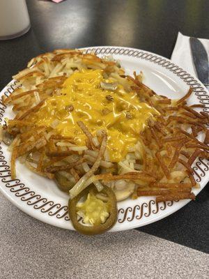 Hashbrowns smothered, covered, peppered, and Capped