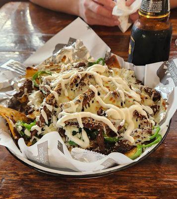 Borracho Nachos with no pico de gallo. Yummy blend of crispy and savory. Meat was super tender and beans were amazing!