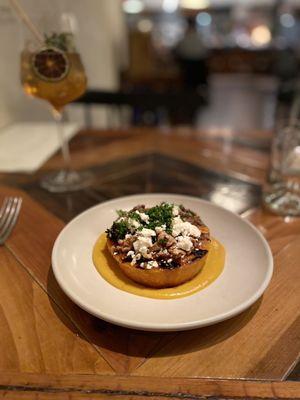 Hearth Roasted Butternut Squash Soup, Smoked Feta, Charred Mustard Greens, Walnut, Virginia Maple