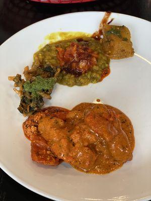 Butter chicken, Green Daal, veg pakora, spiced onions