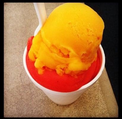 A scoop of strawberry on bottom and a scoop of mango on top!