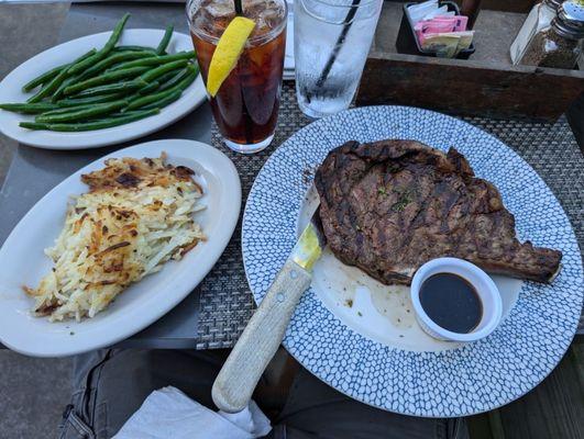 22 Ounce Bone-In Ribeye with potato hash and green beans