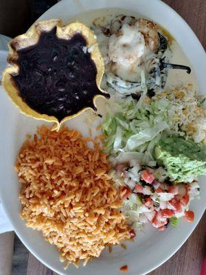 Chile Cancun lunch special with black beans, rice, salad with guacamole. $14.