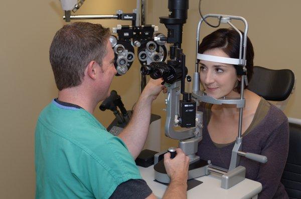 Steven Clark providing a dilated eye exam.