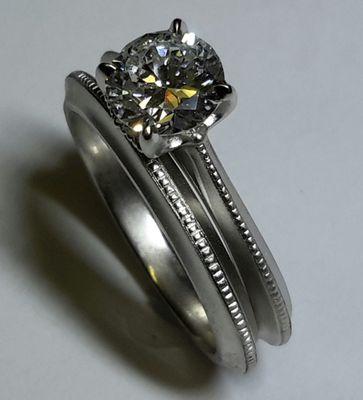 Classy Platinum wedding set with diamond. Love!