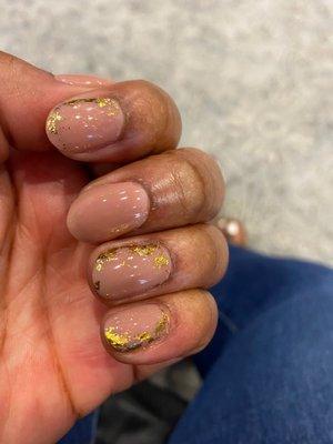 I got a manicure with a gel nude color and gold flakes for the fall