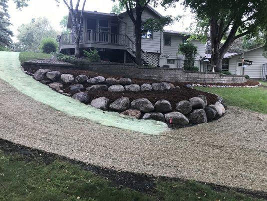 Boulder retaining walls