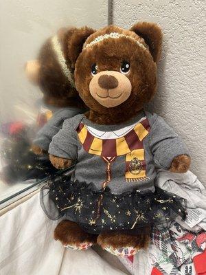 We dressed our bear in one of my baby's onesies. I think it looks cute