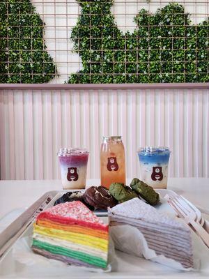 front: rainbow (3/5) + taro (5/5) crepe cakes
 center: cookies (2/5)
 back: ocean latte (3/5) and lychee tea drinks