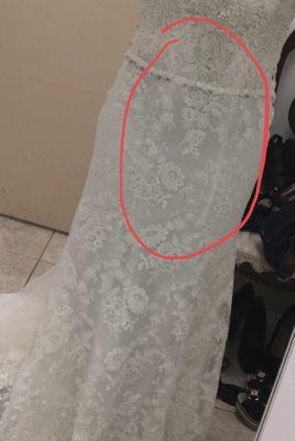 This photo shows how she took from the middle of the dress and i told her to fix that the seams are not supposed to show.