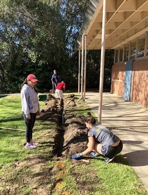 Digging trenches for sprinkler