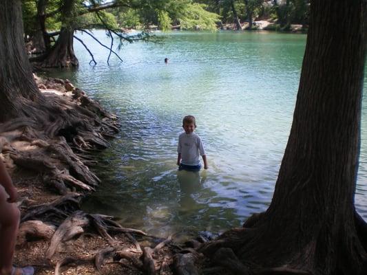 The Frio running through Garner State Park is clear as a bell and running good for tubers.